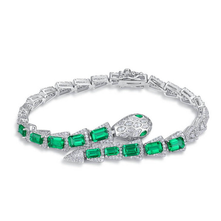 Unique snake emerald bracelet for elegant women